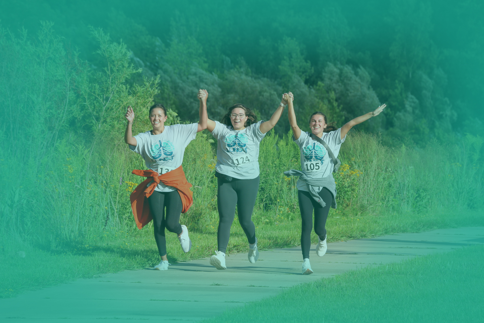 Runners throwing color