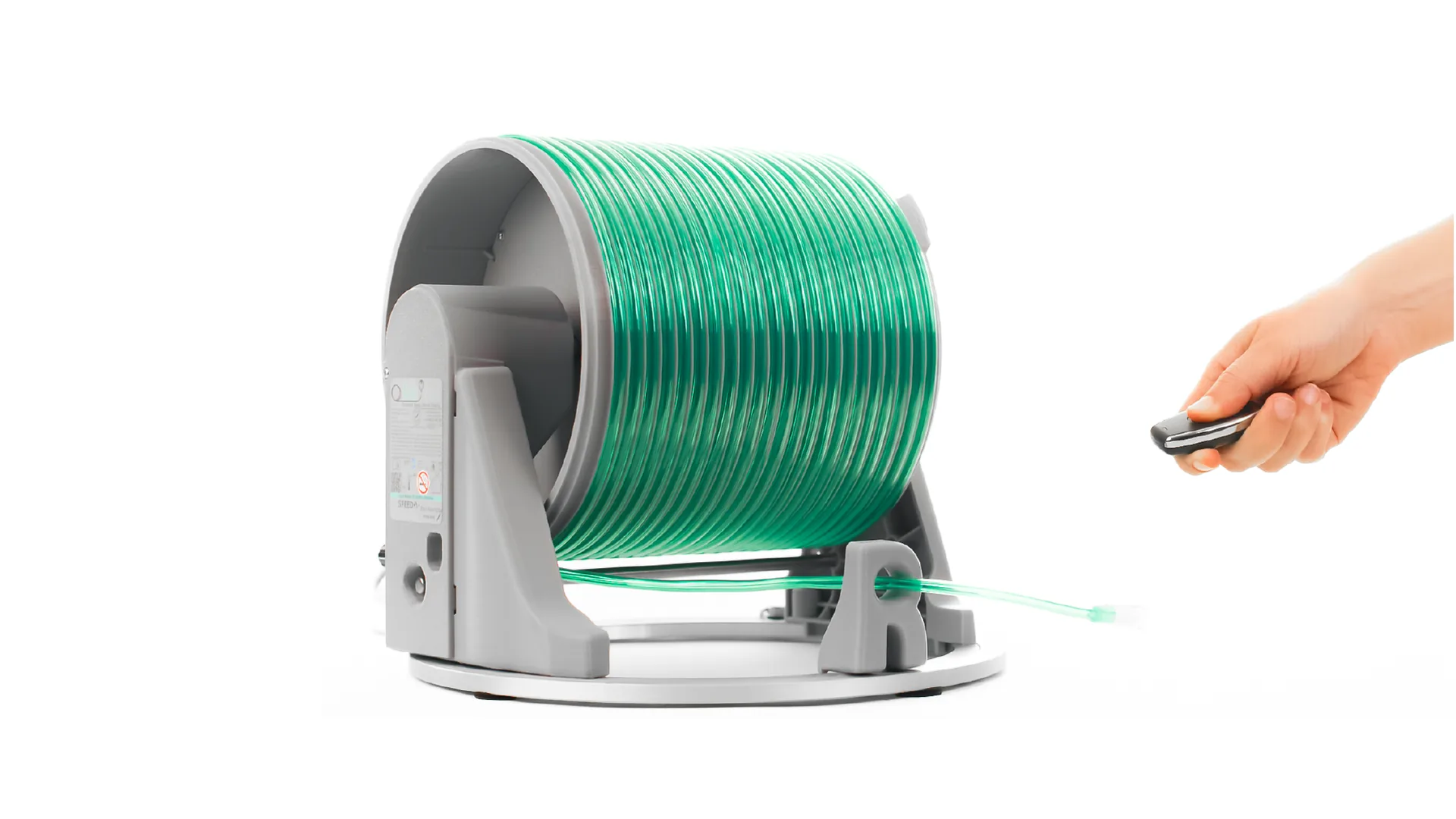 Side view of a retractable oxygen tubing reel showing tubing routing